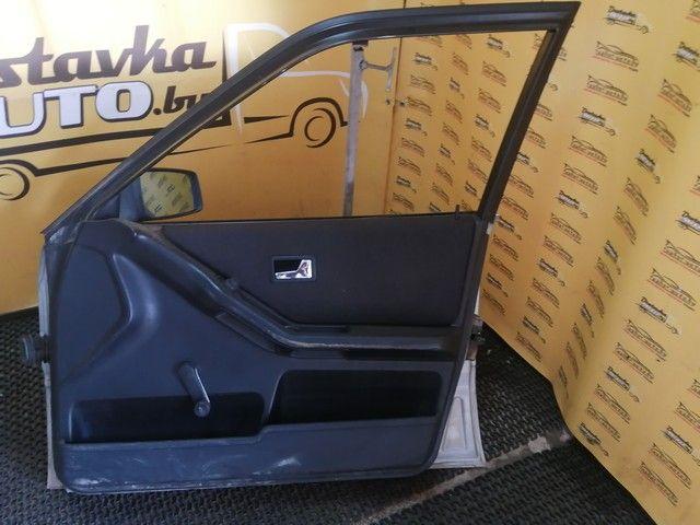 Обшивка двери передней правой (дверная карта) SS370A Audi 80 купить