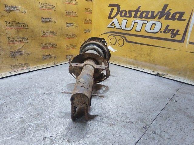 Амортизатор передний левый 0XK3X6 Renault Laguna купить в магазине запчастей бу