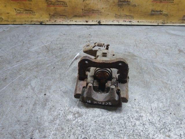 Суппорт задний правый Y2KG8M Renault Scenic купить в магазине запчастей бу