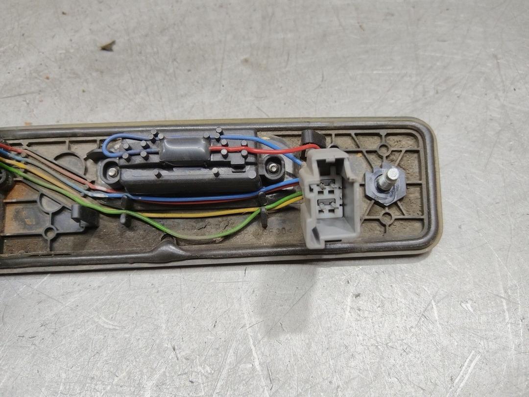 Накладка подсветки номера 4F1CXL Volvo XC70 купить в магазине запчастей бу