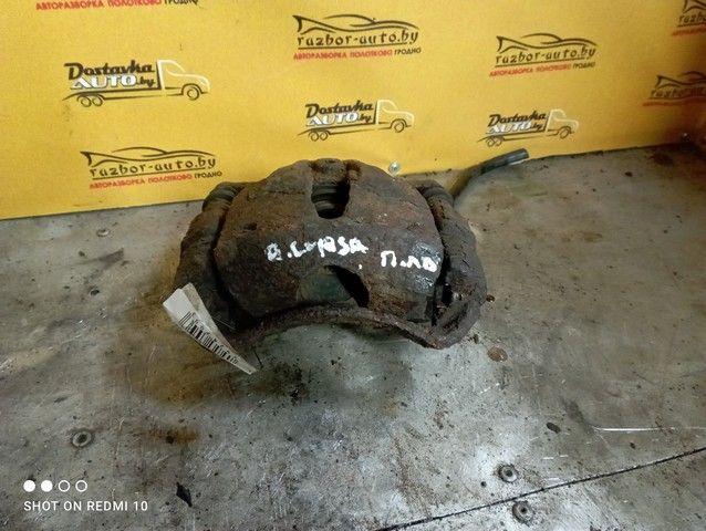 Суппорт передний левый YJ4RA4 Opel Corsa - Фото 2