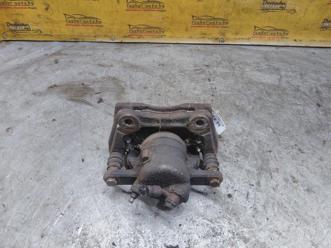 Суппорт передний правый HC1WJX Nissan Note купить в магазине запчастей бу