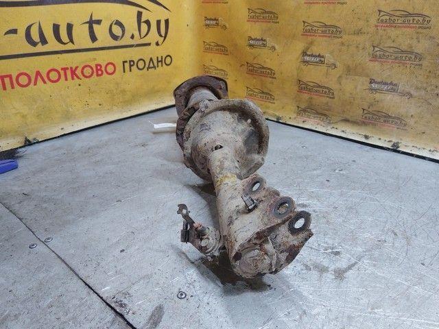 Амортизатор передний правый DK681Z Toyota Yaris купить в магазине запчастей бу