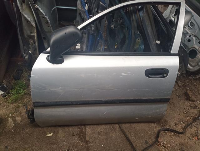 Замок двери передней левой 7N8T02 Mitsubishi Carisma