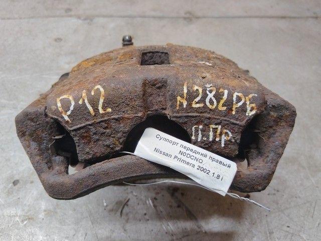 Суппорт передний правый N0DCNO Nissan Primera