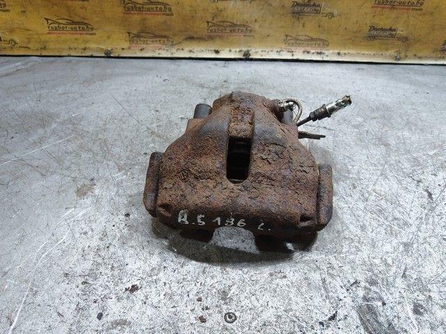 Суппорт передний левый B303EC Volkswagen Passat купить