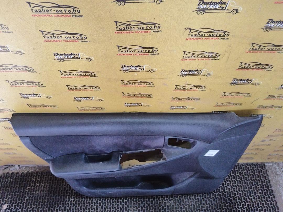 Обшивка двери передней левой (дверная карта) OF47S4 Toyota Corolla купить с доставкой