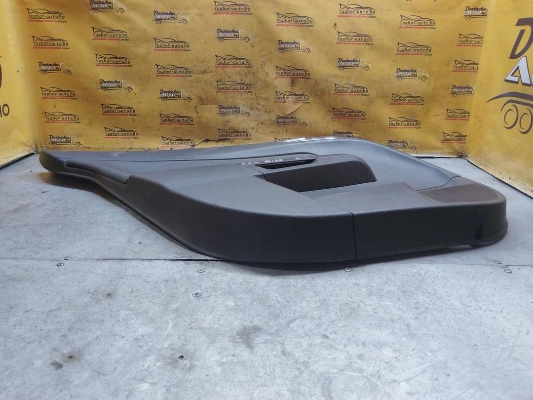 Обшивка двери задней левой (дверная карта) CX5UEL Opel Astra купить с доставкой