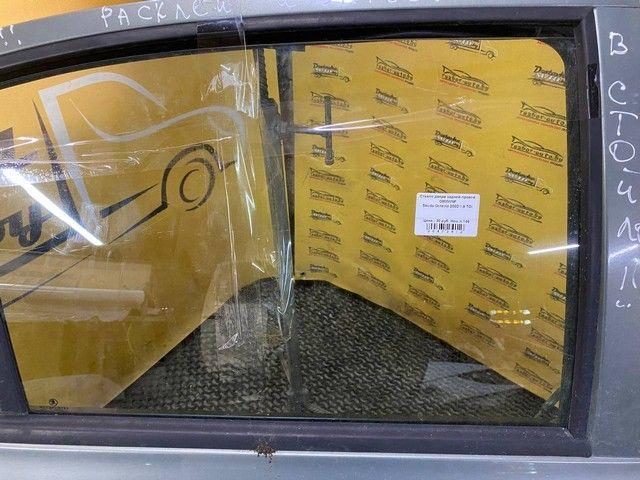 Стекло двери задней правой O8MWNF Skoda Octavia купить в магазине запчастей бу