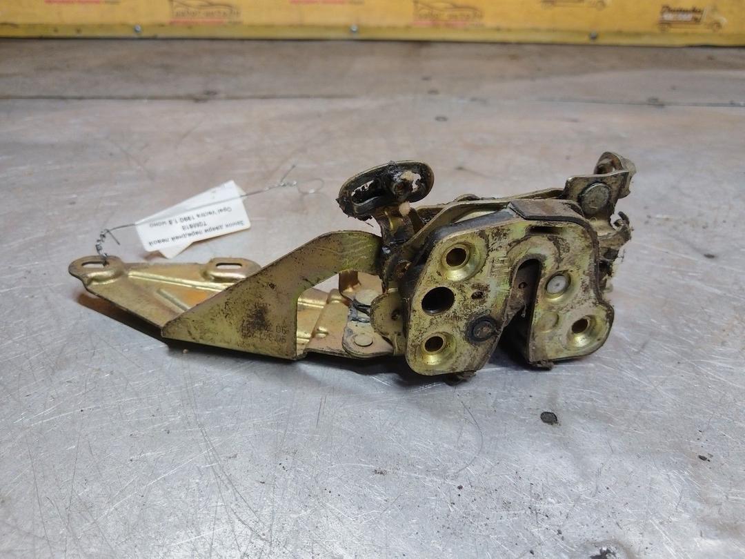 Замок двери передней левой T0M618 Opel Vectra