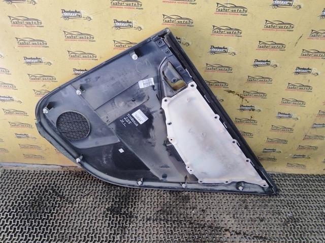 Обшивка двери задней левой (дверная карта) AXWC26 Toyota Corolla купить на авторазборке