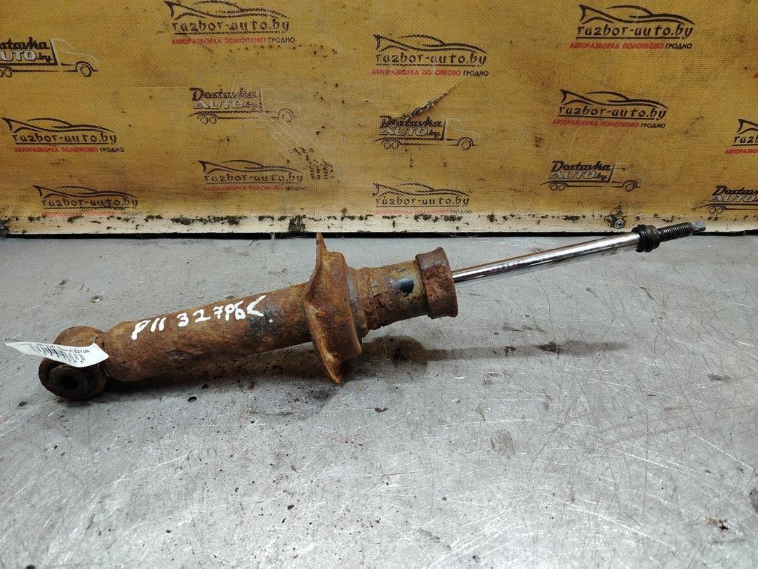 Амортизатор задний левый F07JGS Nissan Primera - Фото 1