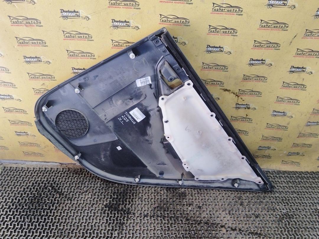 Обшивка двери задней левой (дверная карта) AXWC26 Toyota Corolla купить на авторазборке