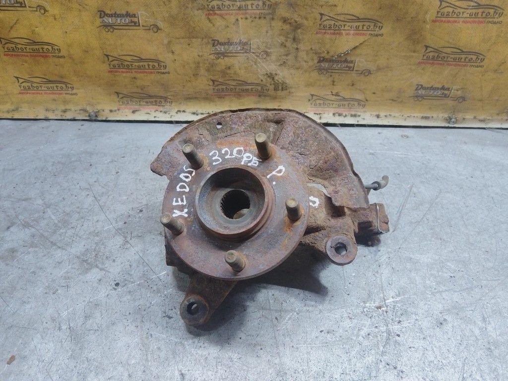 Кулак поворотный правый 1SHM8T Mazda Xedos 6 - Фото 1