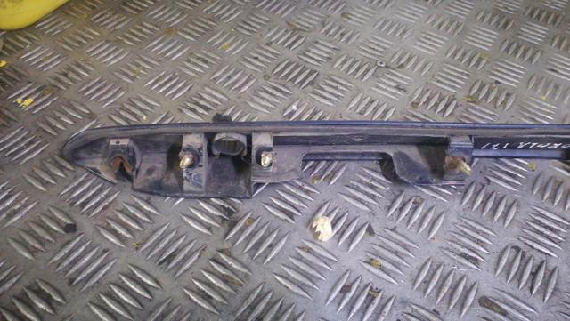 Накладка подсветки номера T1OYTD Toyota Corolla купить