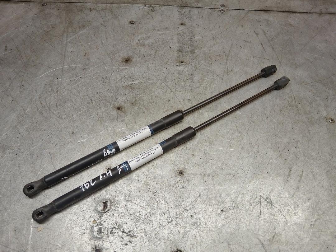 Амортизатор крышки багажника (3-5 двери) Y0AEOC Opel Astra - Фото 1