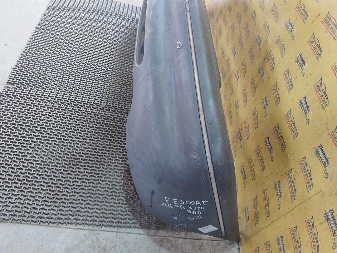 Бампер задний 083DW4 Ford Escort купить в магазине запчастей бу