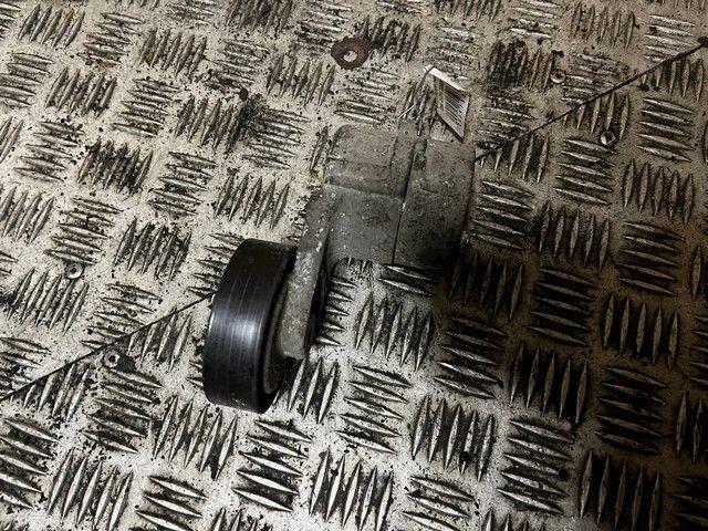 Натяжитель ремня генератора 79AU8V Opel Zafira