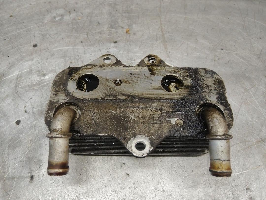 Теплообменник масляного фильтра VJ7OW6 Opel Astra