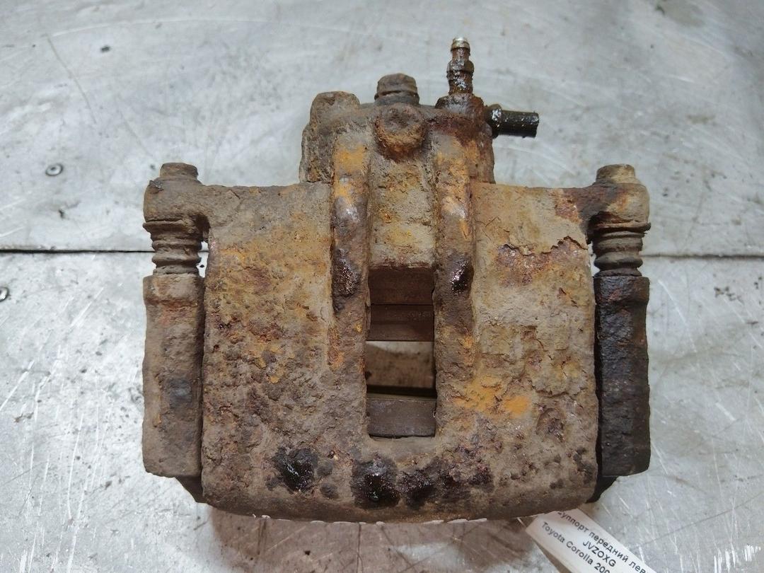 Суппорт передний левый JVZOXG Toyota Corolla купить