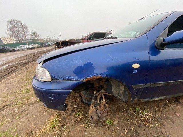 Кулак поворотный левый 1BKL1J Fiat Palio