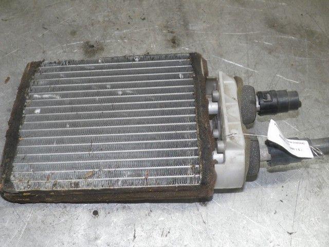 Радиатор отопителя (печки) X0TUE7 Mazda 323F