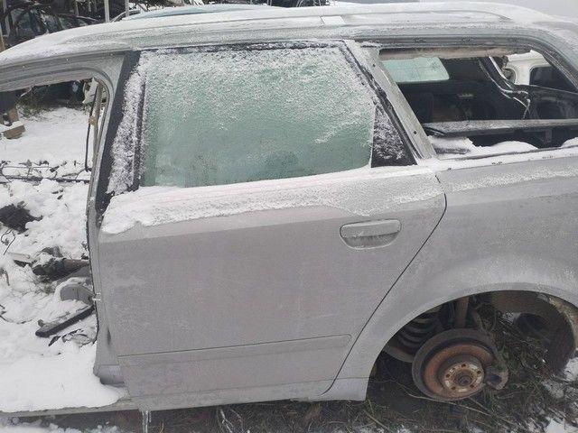 Стекло двери задней левой 285A0U Audi A4