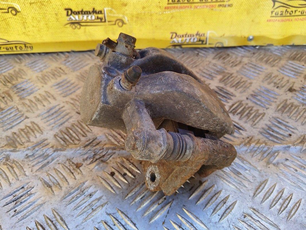 Суппорт задний левый OEQ9N3 Toyota Avensis - Фото 2