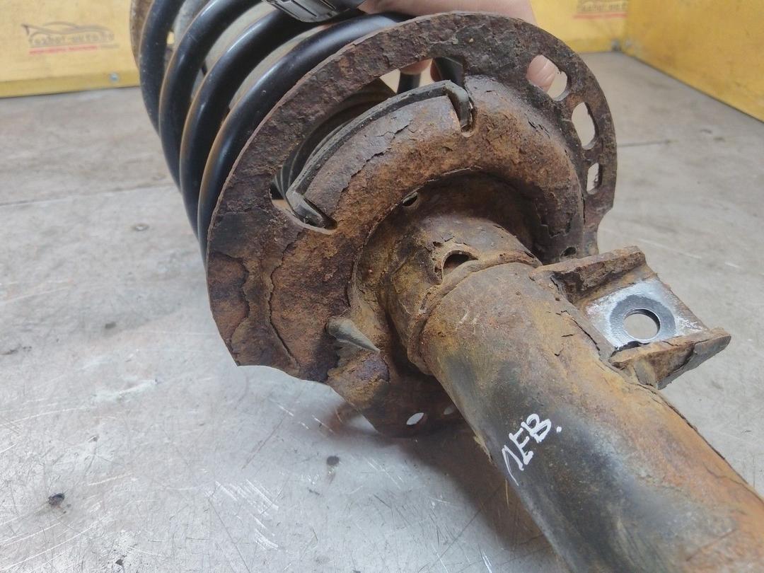 Амортизатор передний левый 4U5EJU Ford Fusion - Фото 6