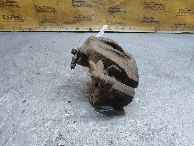 Суппорт передний правый AY9GI2 Toyota Corolla Verso