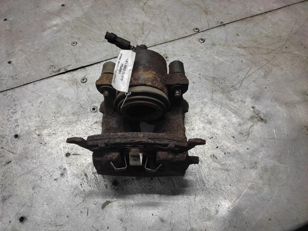 Суппорт передний левый VGNFQ8 Audi A3 - Фото 1