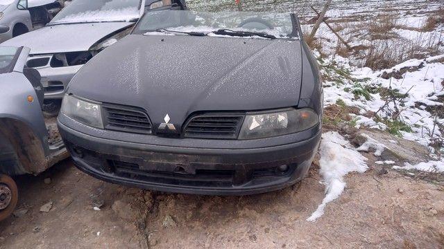 Патрубок отопителя (печки) OLQBJA Mitsubishi Carisma