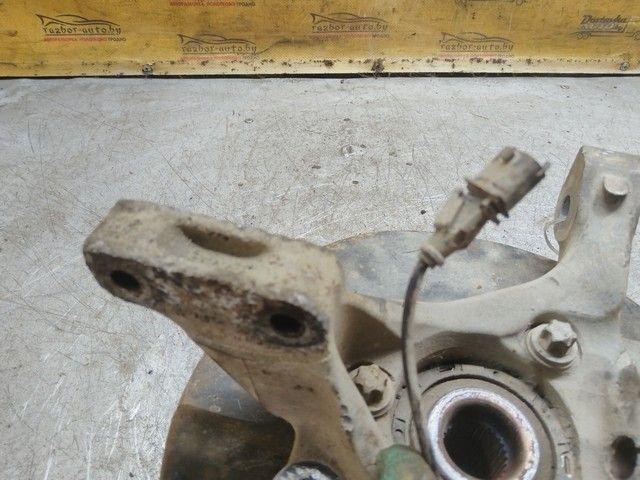 Кулак поворотный левый 1NKQ3A Saab 9-3 купить с доставкой