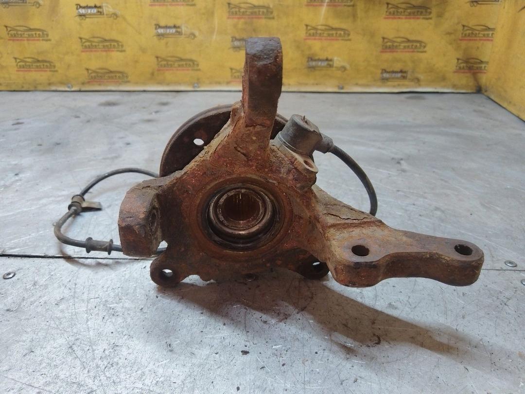 Кулак поворотный левый LVD5B1 Mitsubishi Carisma купить в магазине запчастей бу