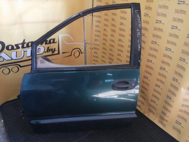 Обшивка двери передней левой (дверная карта) V86PMT Chrysler Voyager