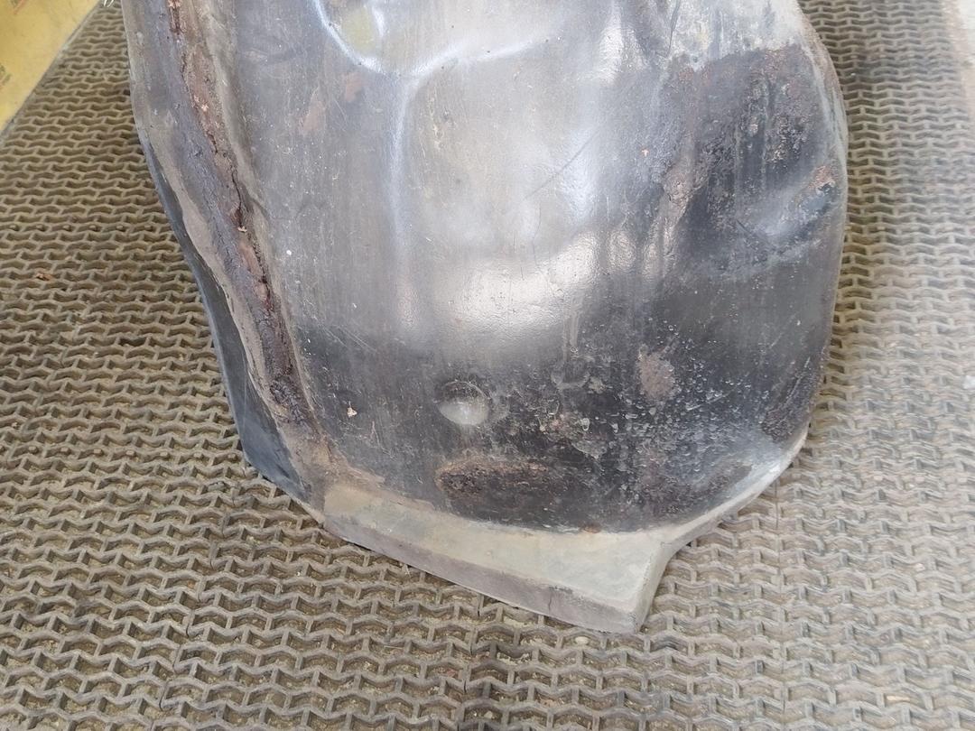 Защита арок передняя левая (подкрылок) W25XMT Opel Astra купить в магазине запчастей бу