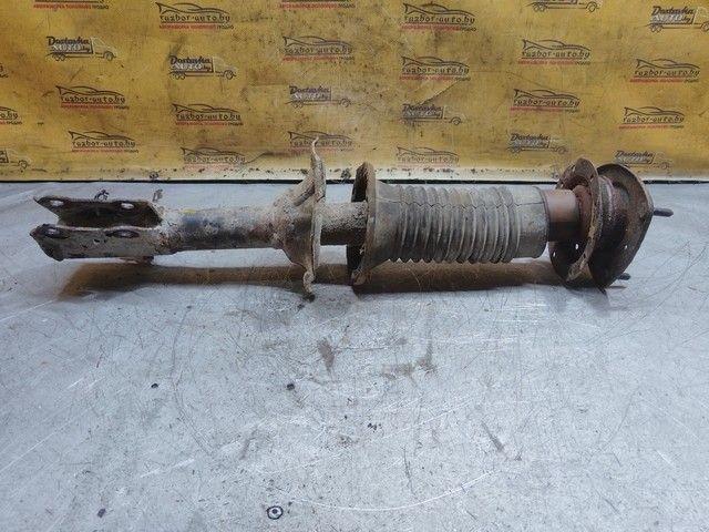 Амортизатор передний правый DK681Z Toyota Yaris купить на авторазборке