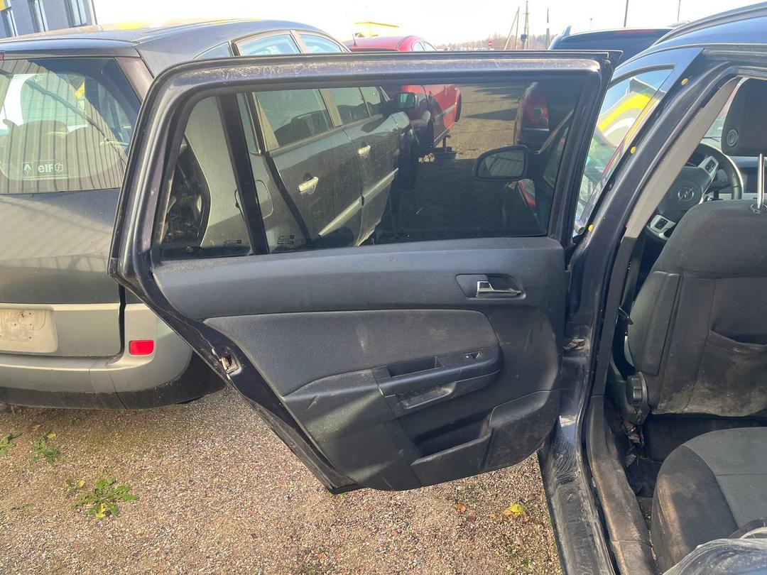 Обшивка двери задней левой (дверная карта) CX5UEL Opel Astra