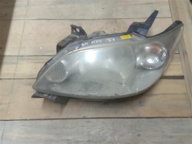 Фара левая E0B066 Mazda MPV