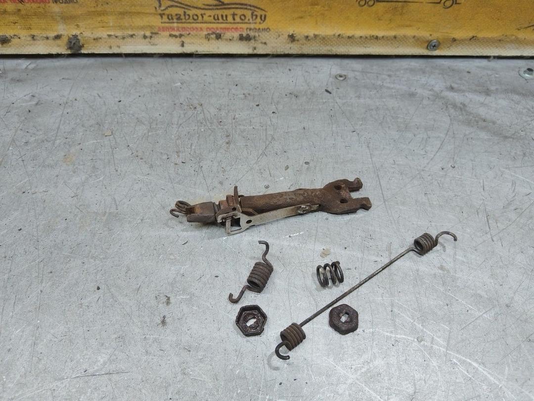 Механизм развода задних тормозных колодок левый HDJ2T9 Renault Megane