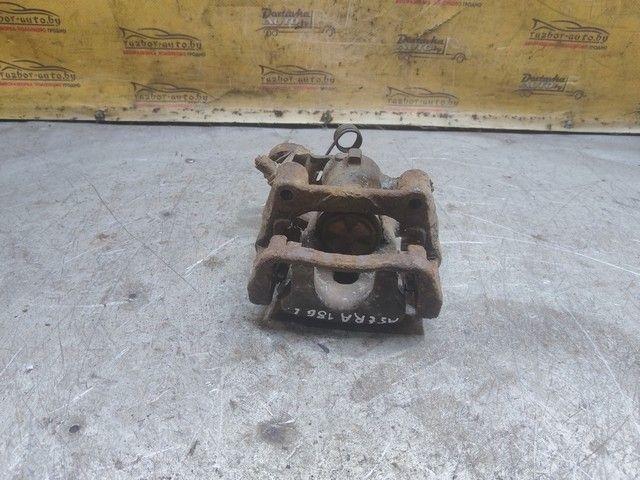 Суппорт задний левый X0WN61 Opel Astra купить на авторазборке