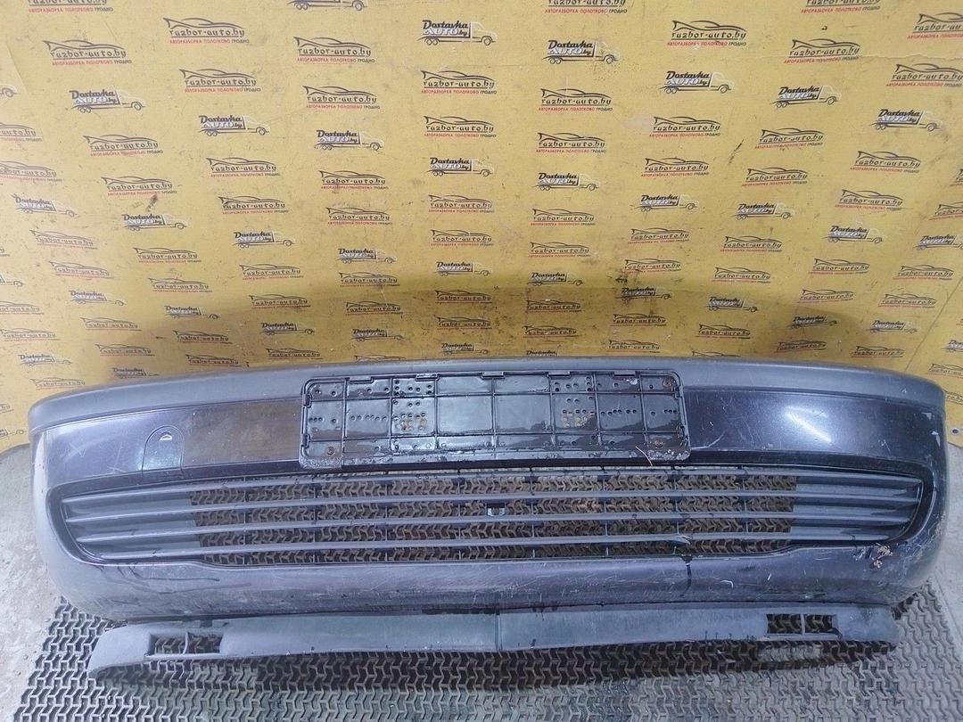 Бампер передний 444QE9 Opel Zafira