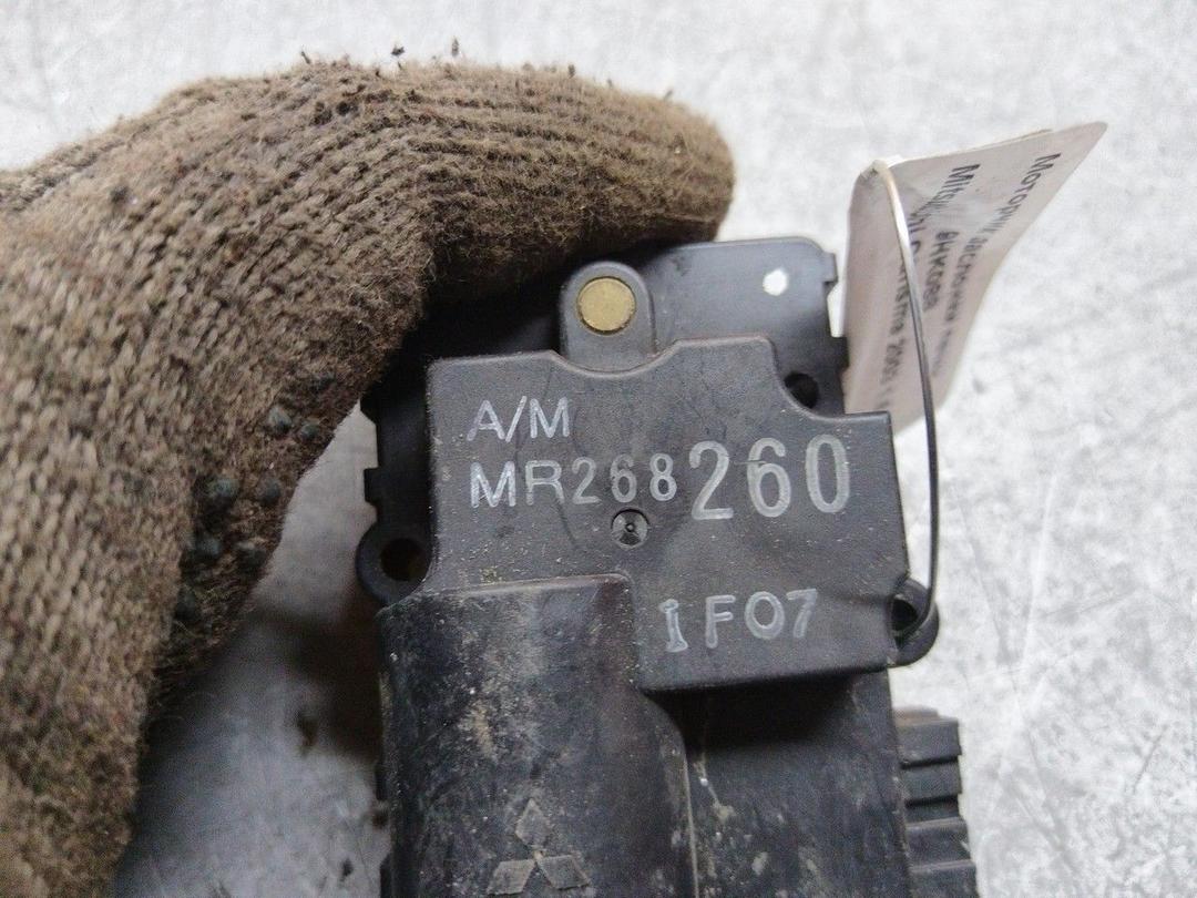 Моторчик заслонки печки 9HK088 Mitsubishi Carisma купить
