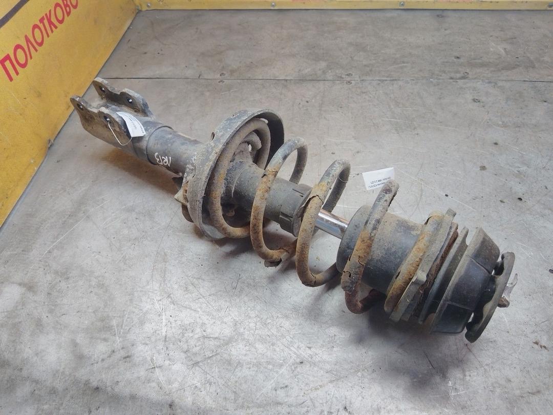 Амортизатор передний левый 0X9WZ7 Opel Astra