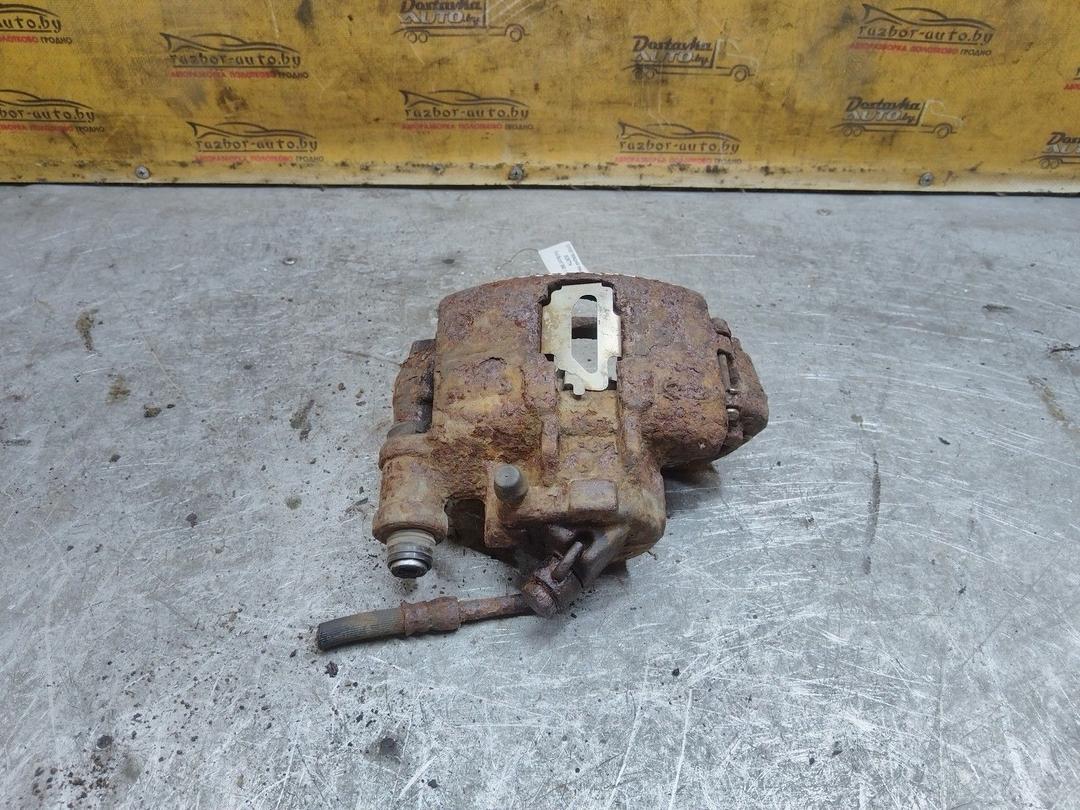 Суппорт передний левый MORT7H Ford Escort