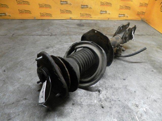 Амортизатор передний левый T6BL88 Toyota Avensis купить