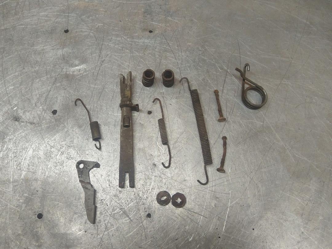 Механизм развода задних тормозных колодок левый 02Q6JZ Peugeot Partner - Фото 1