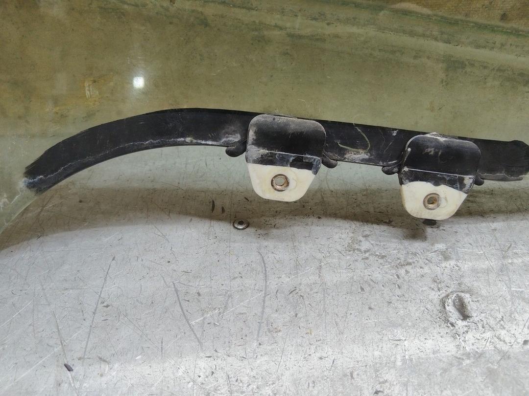 Стекло двери задней левой JYVNZM Rover 600 купить в магазине запчастей бу