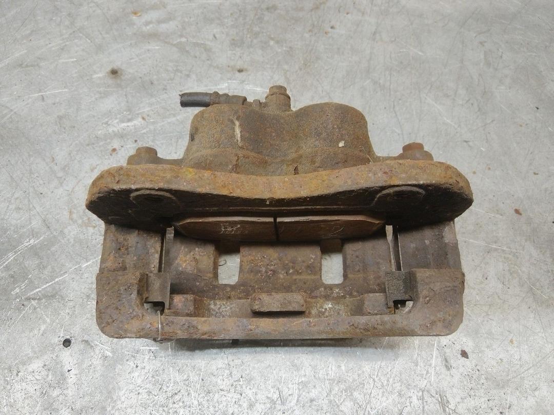 Суппорт передний левый UMSTKD Hyundai Trajet - Фото 5