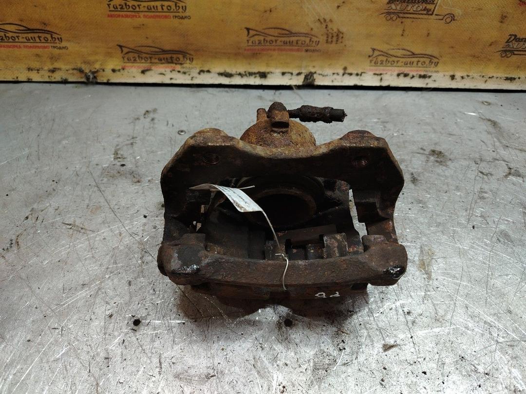 Суппорт передний правый L62K3K Nissan Primera - Фото 4